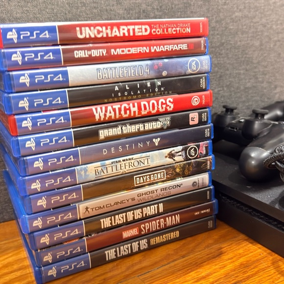 Sony PlayStation 4 Console with Games and Controllers - Black